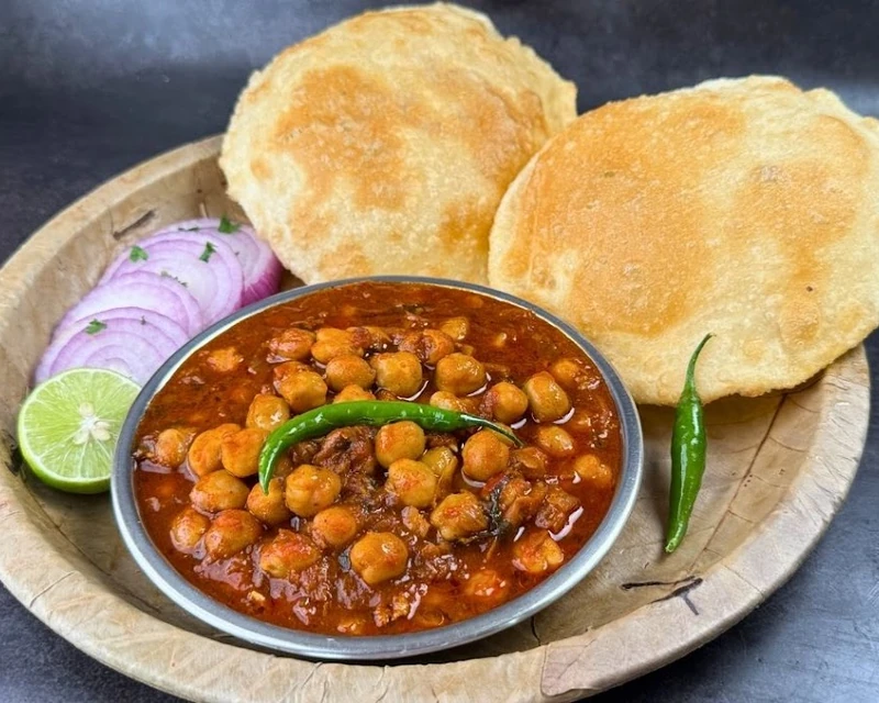 Choley bhaturey with fluffy fried bread at Ambala Chaat House in Edmonton, AB